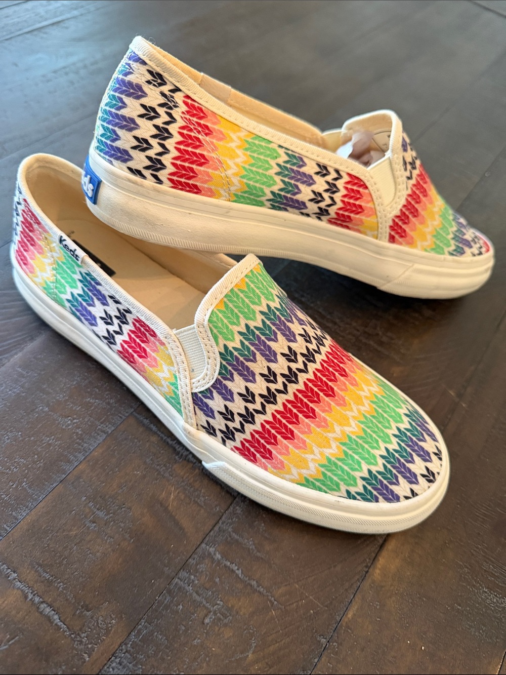 Keds Slip-On Sneakers in Rainbow Chevron (red, yellow, green, blue, purple)